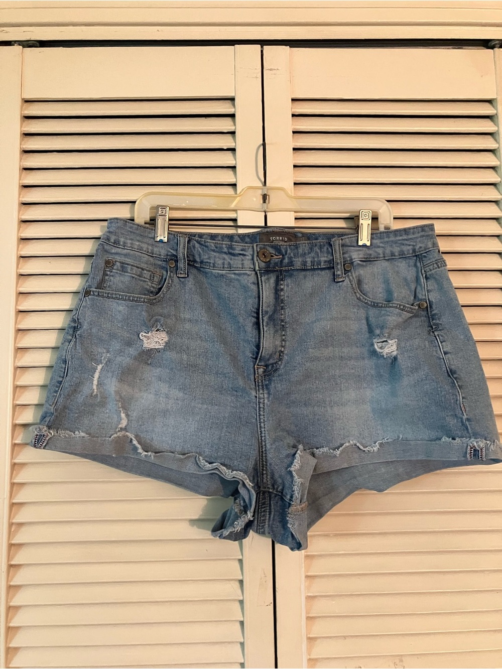 Torrid Feel the Fit size 14 Distressed Blue Jean Shorts with Raw Hem